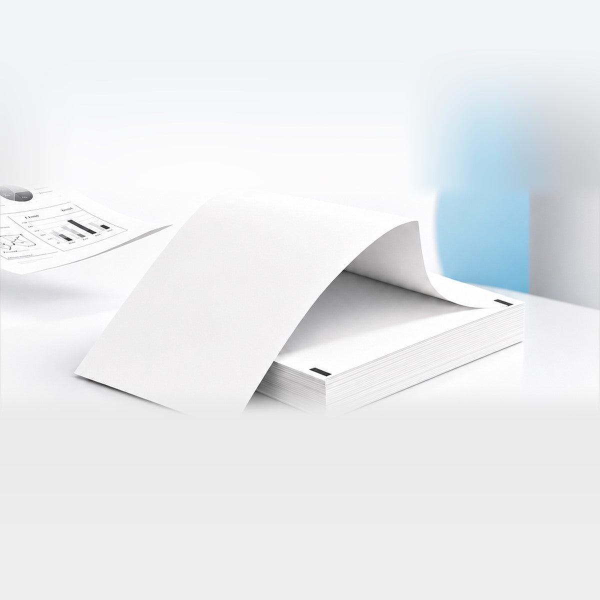 Stack of folded A4 thermal paper with the top sheet unfolding